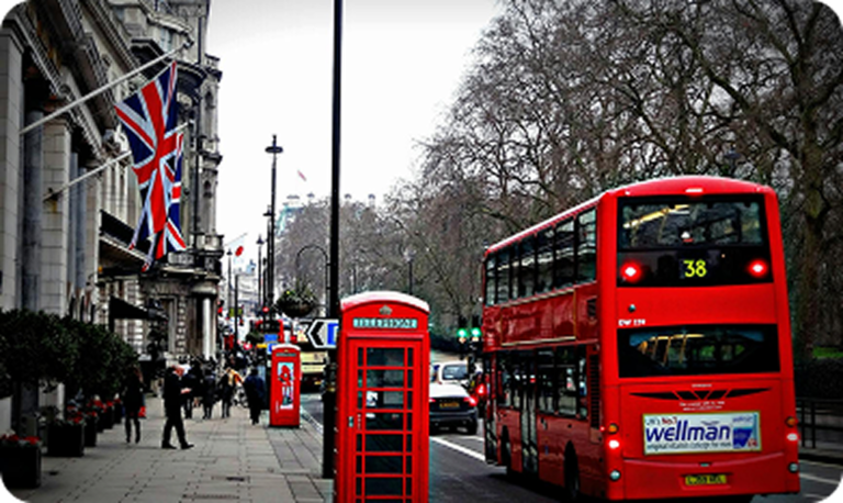 Red London bus with number 38 displayed.